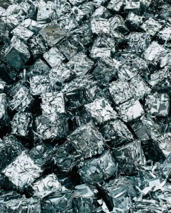 Compressed bales of shredded aluminium scrap